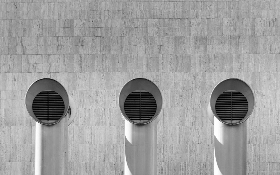 Commercial furnace pipes on a roof.